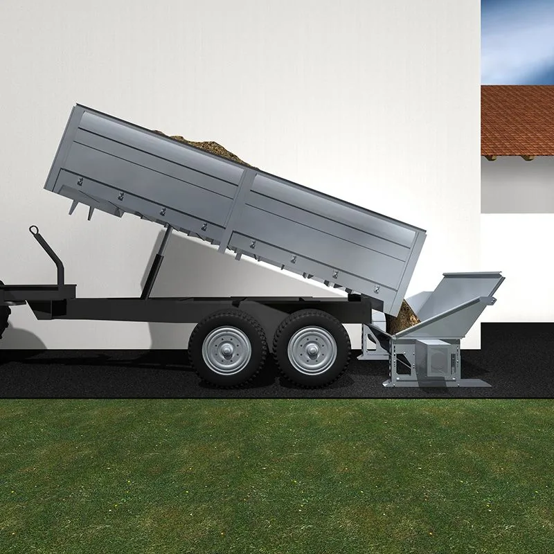 Truck unloading into receiving trough